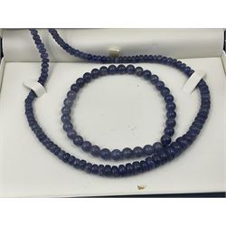 Tanzanite bead necklace with silver clasp and matching bead bracelet, together with two pairs of silver marcasite and amethyst pendant earrings, all retailed by Shipton & Co