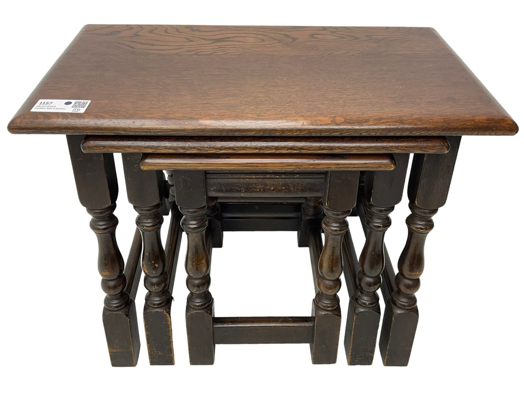 Mid-to-late 20th century medium oak nest of three occasional tables