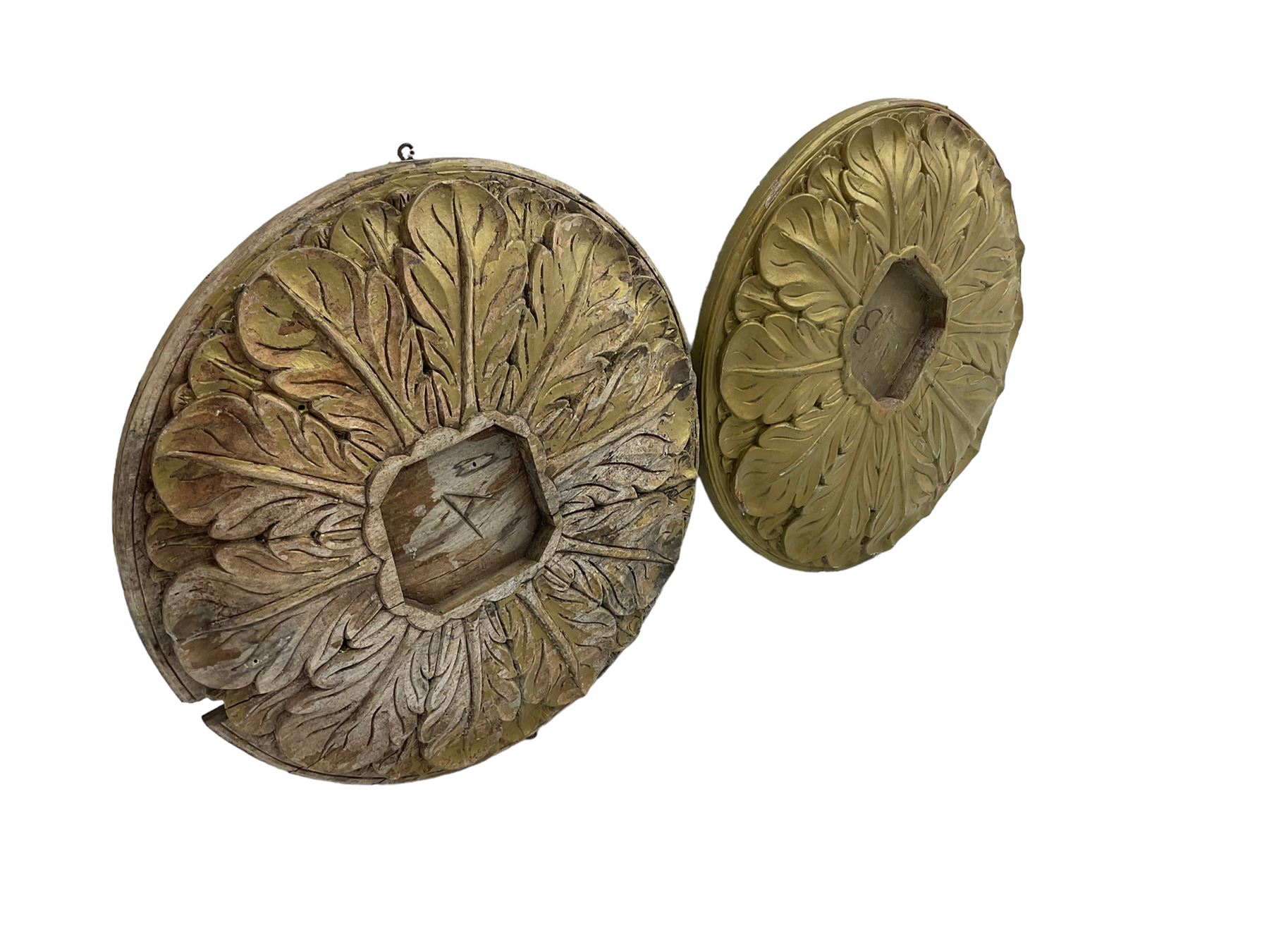 Two 20th century hardwood mounts, circular form carved with extending acanthus leaves