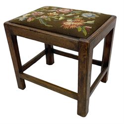 19th century country elm stool, rectangular form with drop-in seat upholstered in floral needlework, moulded frame and supports, united by plain stretchers 