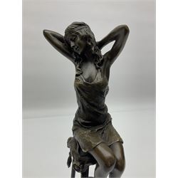 Art Deco style bronze modelled as a female figure seated upon a chair, after 'Pierre Collinet', H28cm