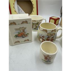 Royal Doulton Bunnykins teawares, including teacups and saucers, egg cup, money boxes etc (12)