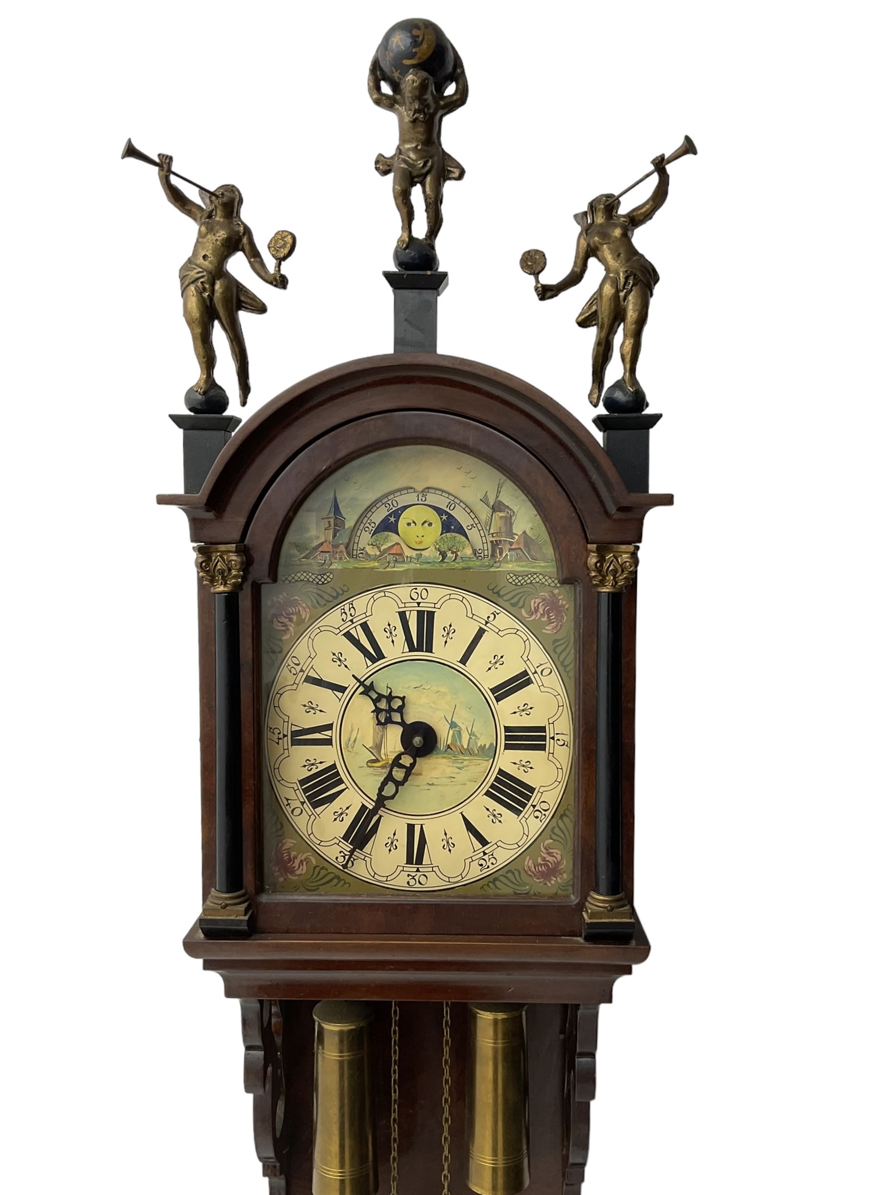 20th century weight driven Dutch WUBA wall clock -  with a break arch top and mounted gilt figures to the arch, painted dial with working moon disc, chapter ring with Roman numerals and pierced steel hands, twin train chain driven movement striking the hours on a bell. With pendulum and brass cased weights.