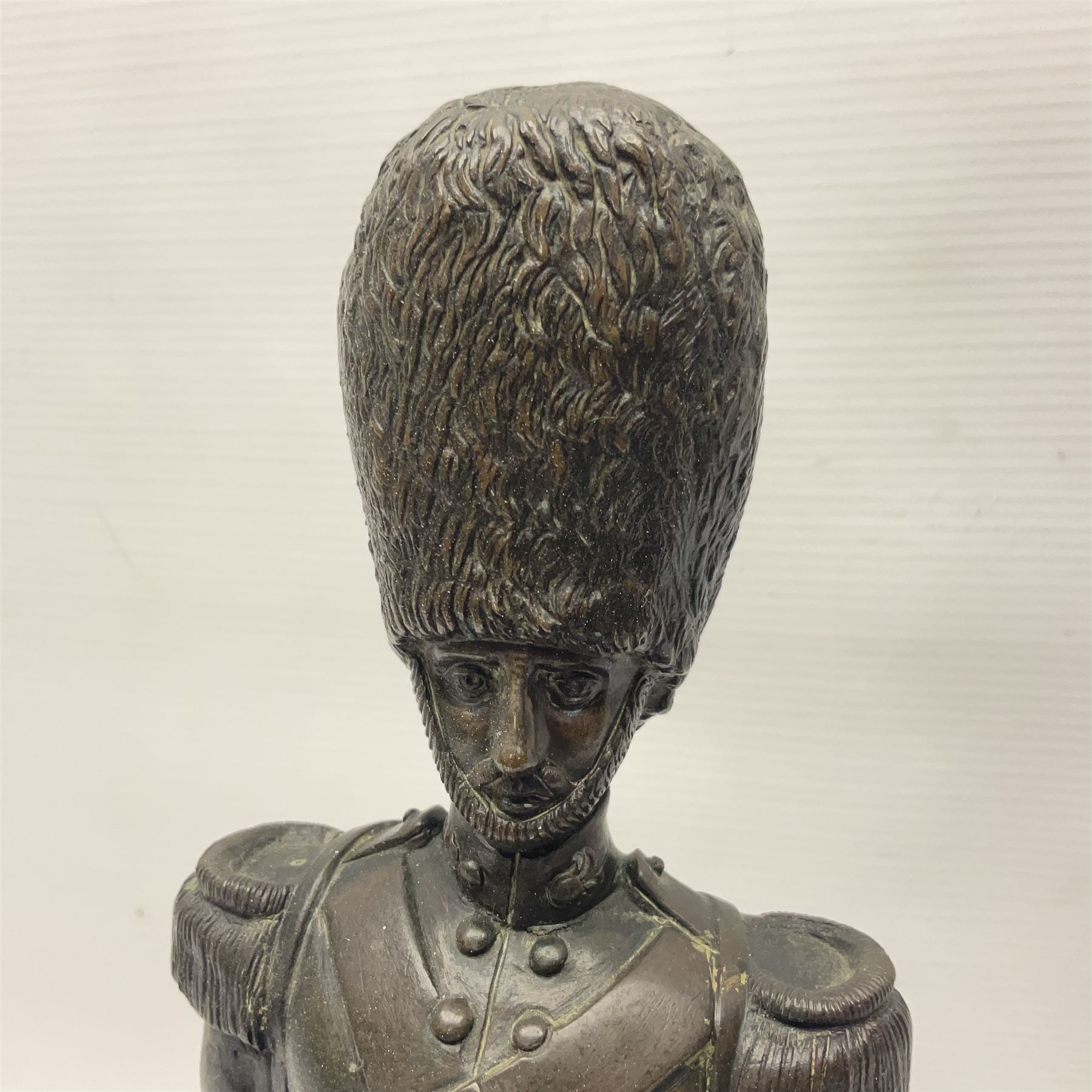 Bronzed figure of a Grenadier guard, H33cm