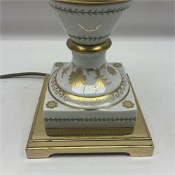 Mangani table lamp, shaped as an urn with twin handles, with gilt decoration upon a stepped base, H80cm