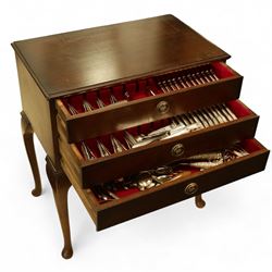 George Butler & Co. canteen of silver plated cutlery, for eight persons, plus additional cutlery, including a set of six silver teaspoons, pair of white metal salad servers and various silver-plated and brass flatware, in a three-drawer mahogany canteen case raised on cabriole legs