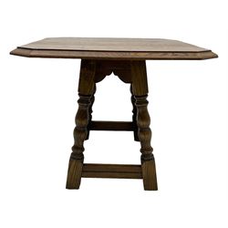 20th century oak drop-leaf table, bevel edged square top with cut corners, raised on splayed turned baluster supports united by stretchers