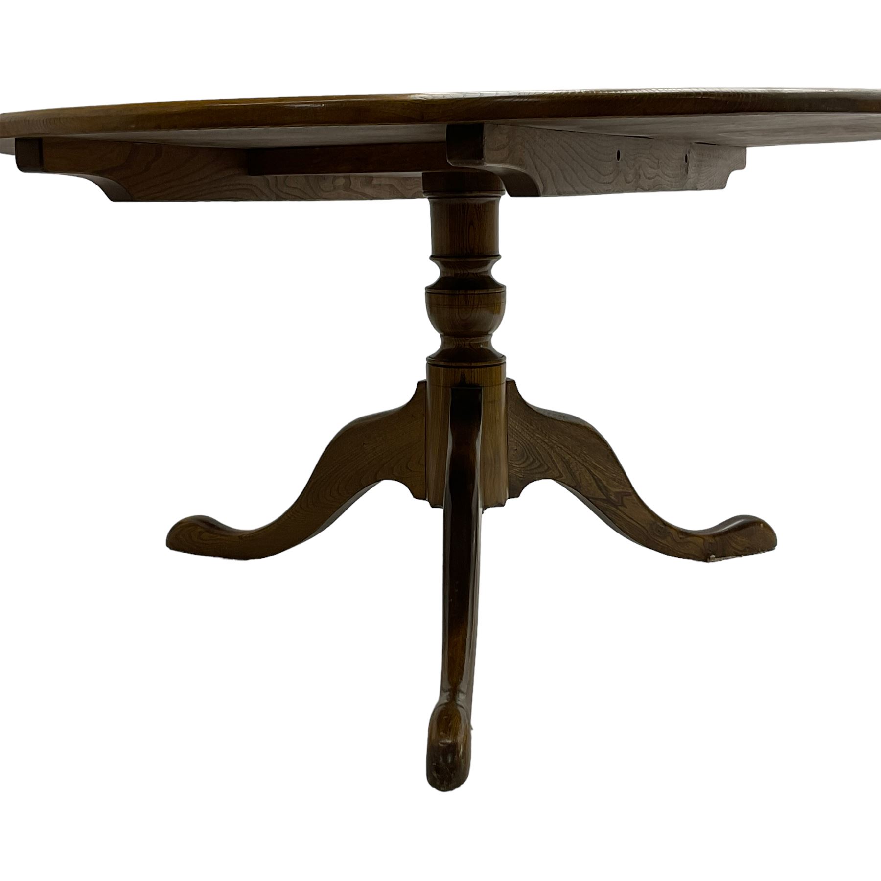 David Shackleton of Snainton - circular figured elm dining table, turned pedestal column on three splayed supports; together with a set of eight dining chairs, shaped cresting rail over shaped and pierced splat, upholstered drop in seat, on square supports united by stretchers 