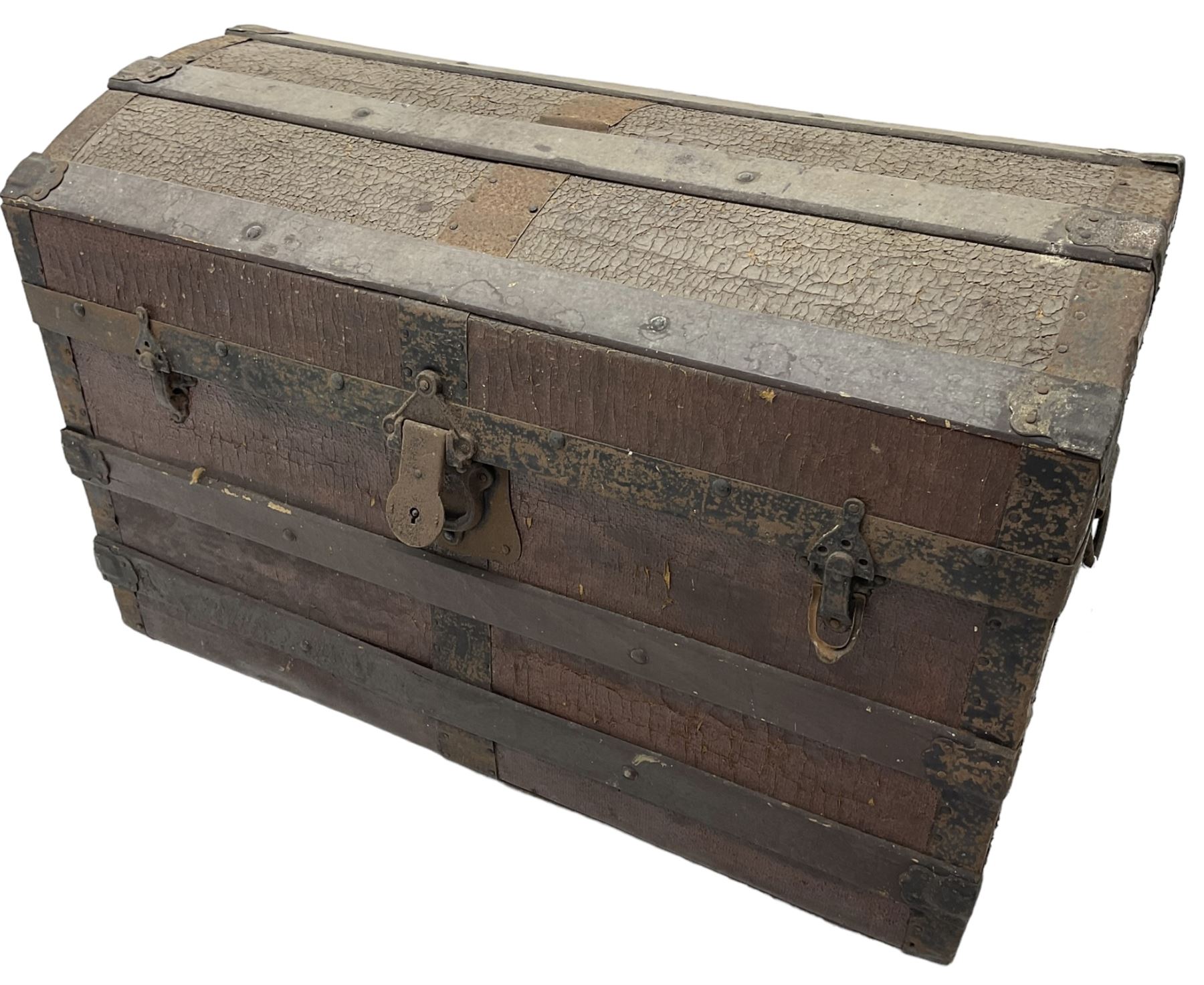 Late 19th to early 20th century leather and wood bound chest with metal fixtures 