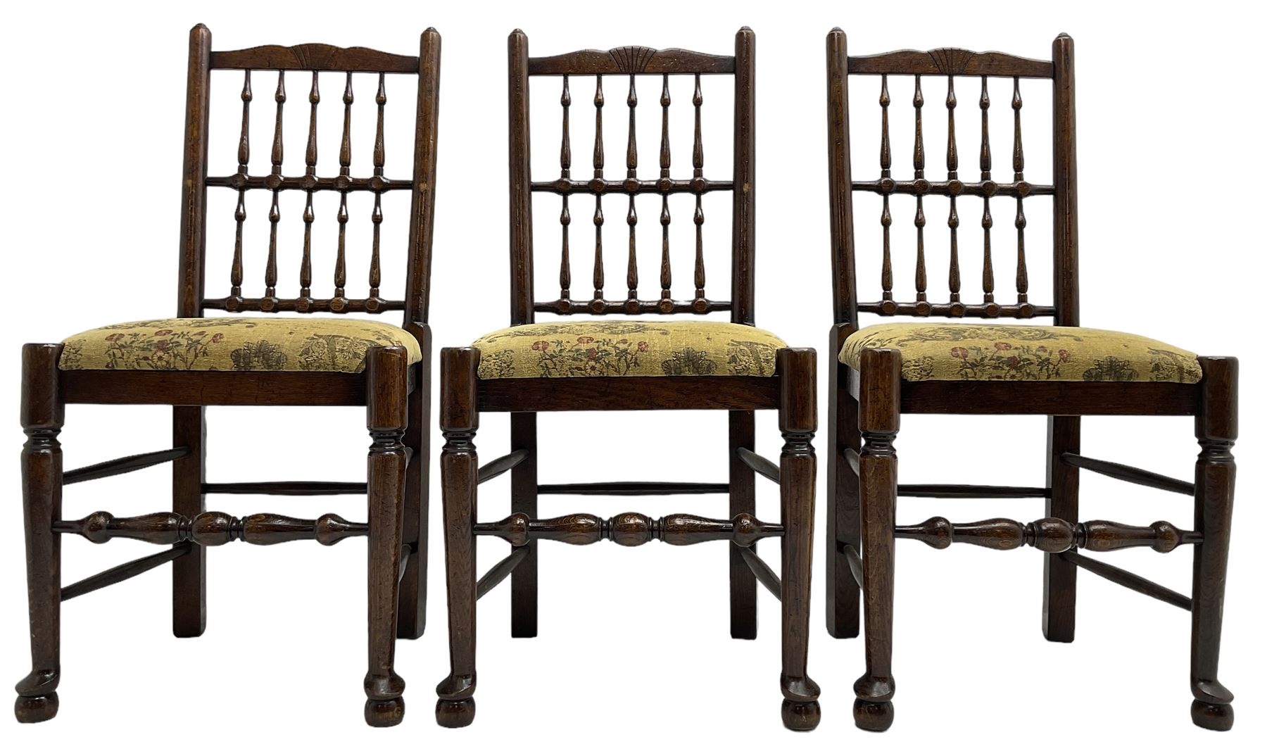 Set of six (4+2) 20th century oak spindle back dining chairs, with upholstered drop-on seat cushions, turned supports joined by turned stretchers