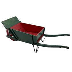 19th century green and red painted wooden wheelbarrow, flat bed with removable sides and back, wooden and wrought metal strap wheel 