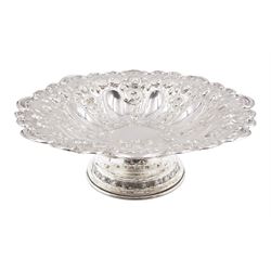 Edwardian silver pedestal bowl, of circular form, with shaped C scroll rim, embossed with floral and foliate decoration throughout, upon a circular foot, hallmarked Elkington & Co Ltd, Birmingham 1901, H9.5cm, D25cm