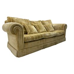 Duresta England - three-seat sofa, upholstered in pale gold fabric, traditional shape with rolled arms