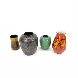 Four Poole Pottery vases, including a black Calypso example, small yellow Aegean example, ...