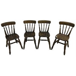 Set of four 20th century oak farmhouse dining chairs, bar cresting rail over turned spindle back, on turned supports united by turned stretchers 
