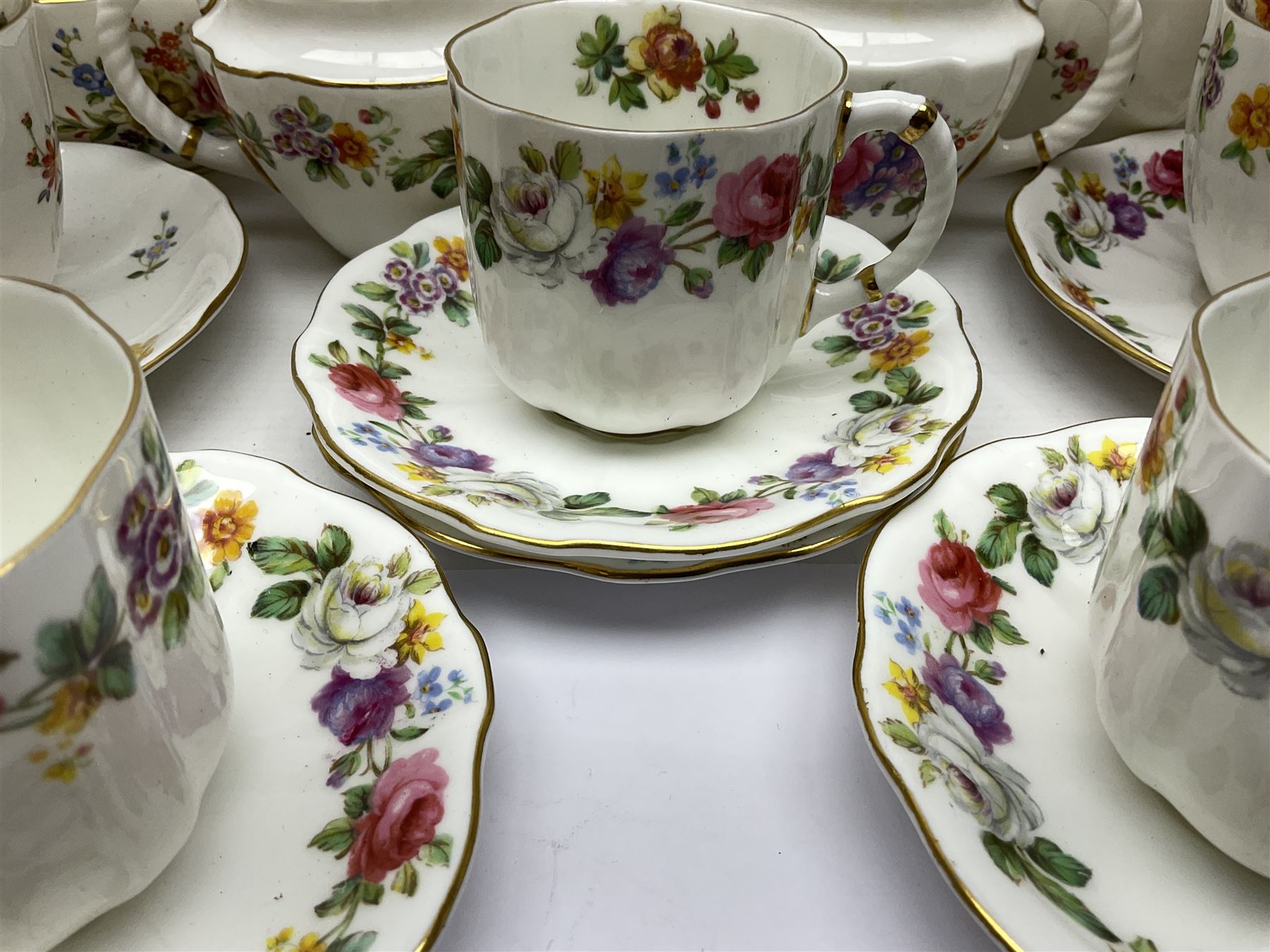 Royal Crown Derby Posies pattern tea service, including two milk jugs, two open sucrier, twelve teacups and saucers, twelve dessert plates etc 