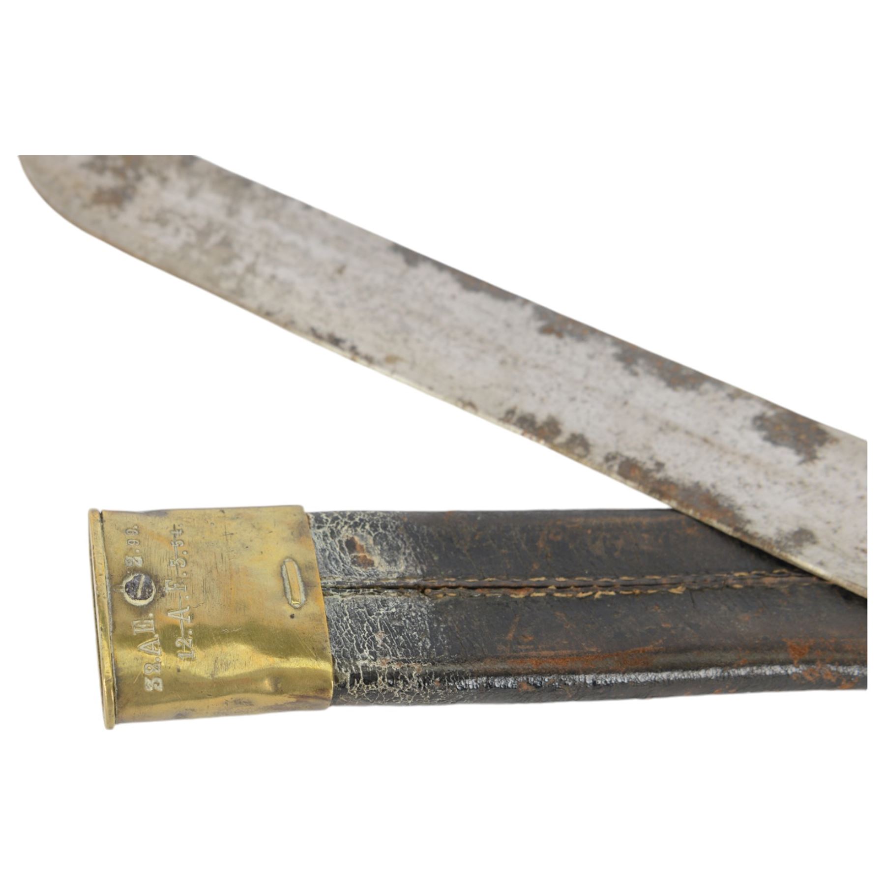 Prussian model 1855 Infantry Pioneers short sword, single edge blade stamped with a crown, quillon marked 28 AE.3.99. 32.A.E.2.99.1, with ribbed grip, in brass mounted leather scabbard, L65cm