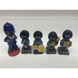 Four Robertson musician golly figures, together with Carlton ware figure etc 