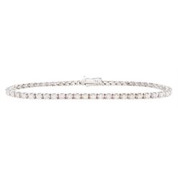 18ct white gold round brilliant cut diamond line bracelet, stamped 750, total diamond weig...