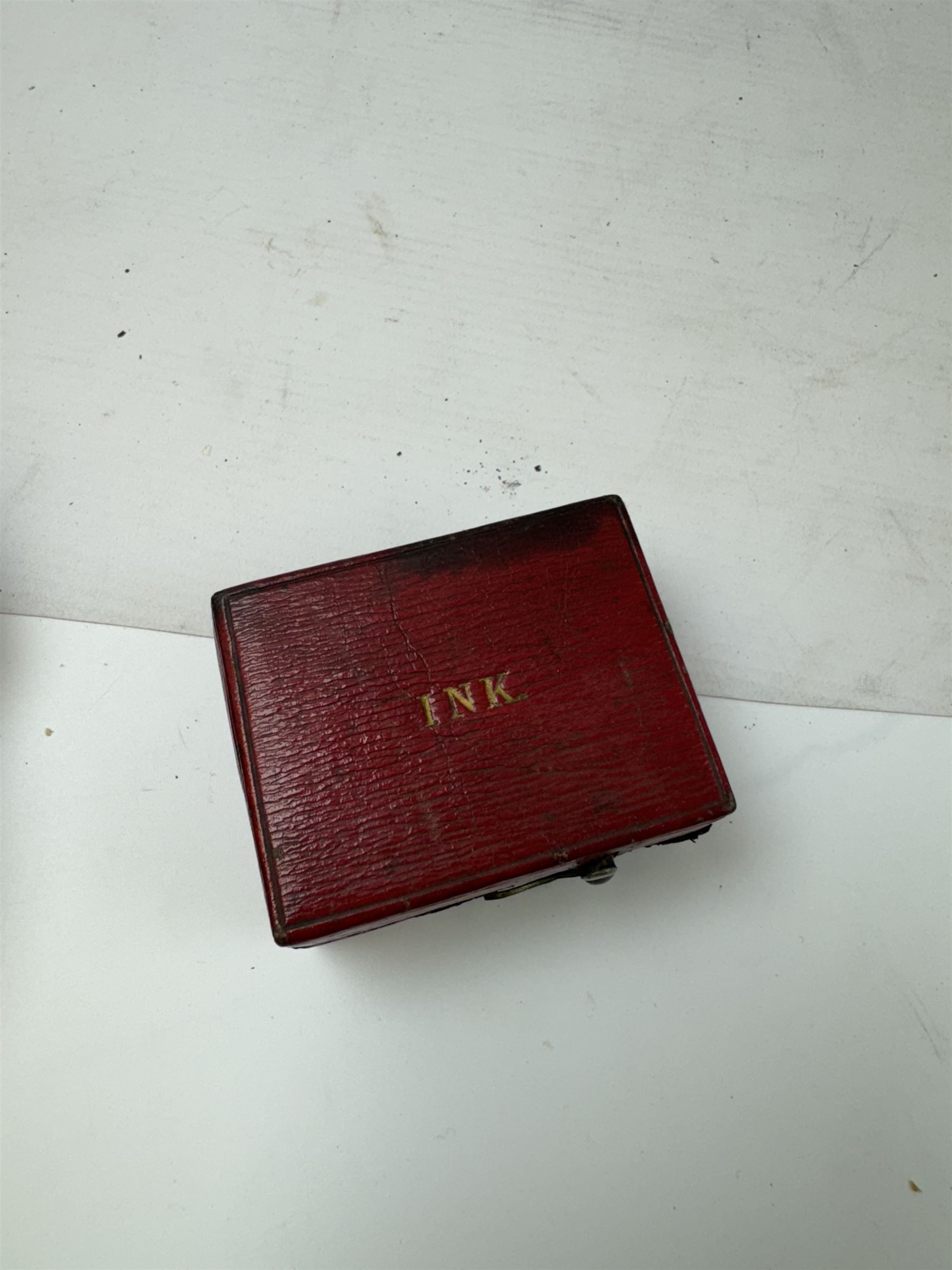 Six leather bound travelling inkwells, to include Berry's Patent example, all with glass liners