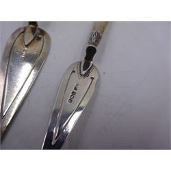 Four modern silver trowel/sword page markers, two examples with mother of pearl handles, one with an embossed handle, all hallmarked 