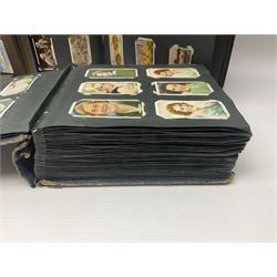 Four albums of cigarette cards, including Will's and Player's examples