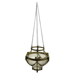 Edwardian brass ceiling light of circular bulbous form, moulded upper band over a guilloche cast central band united by shaped strapping, decorated with fruiting foliage festoons, fitted with frosted and vertical bevelled glass bowl, acanthus cast finial 