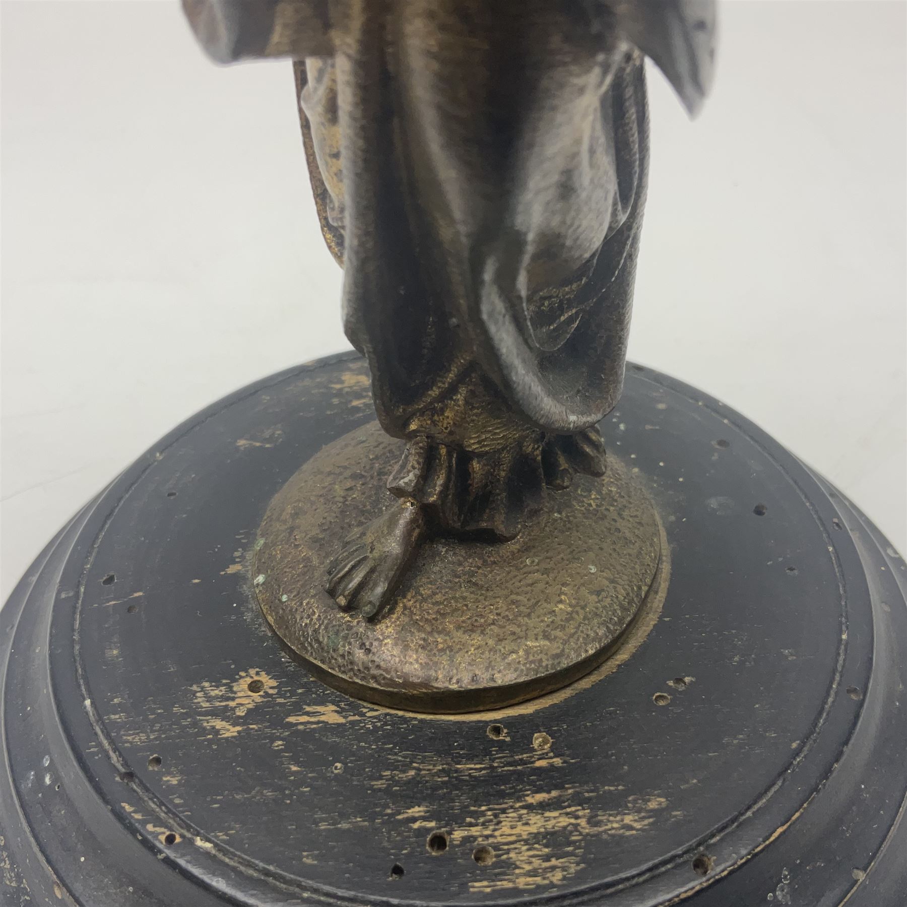 Gilt bronze figure of a lady in neo-classical dress, on a circular wooden plinth, H26cm