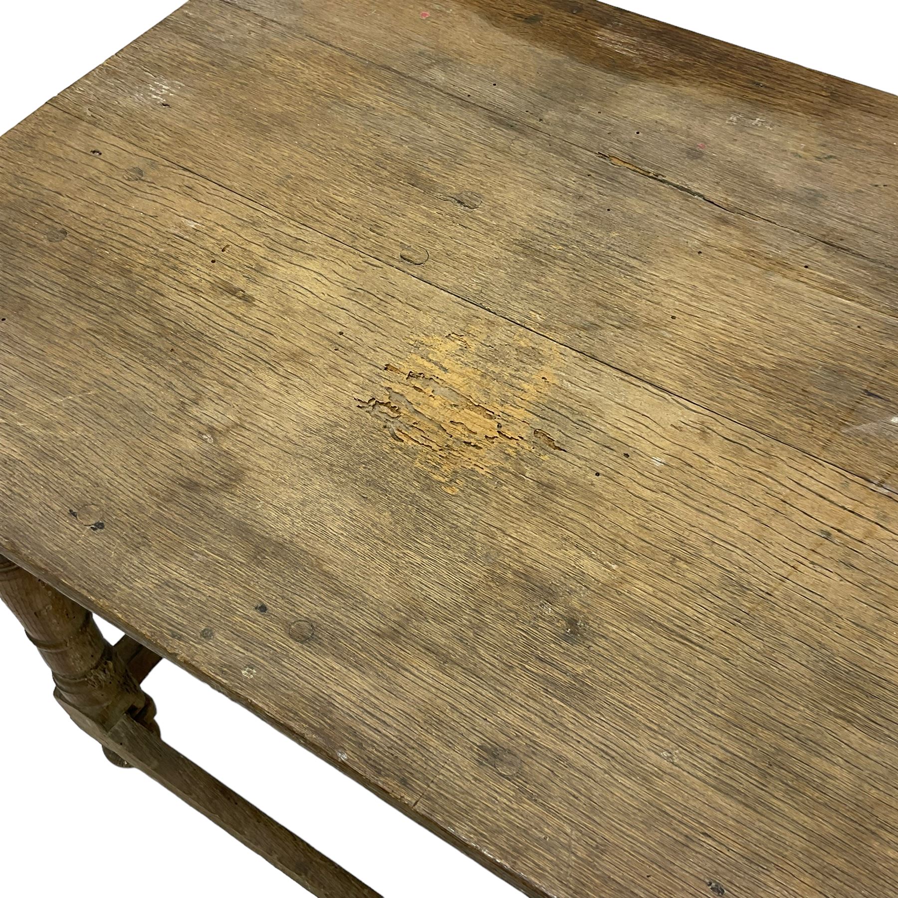 18th century oak joined table, rectangular pegged plank top on turned supports united by plain stretchers