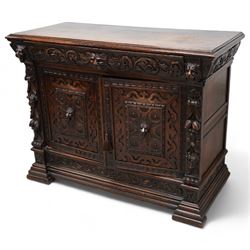 19th century Jacobean Revival heavily carved oak side cabinet, rectangular top with moulde...