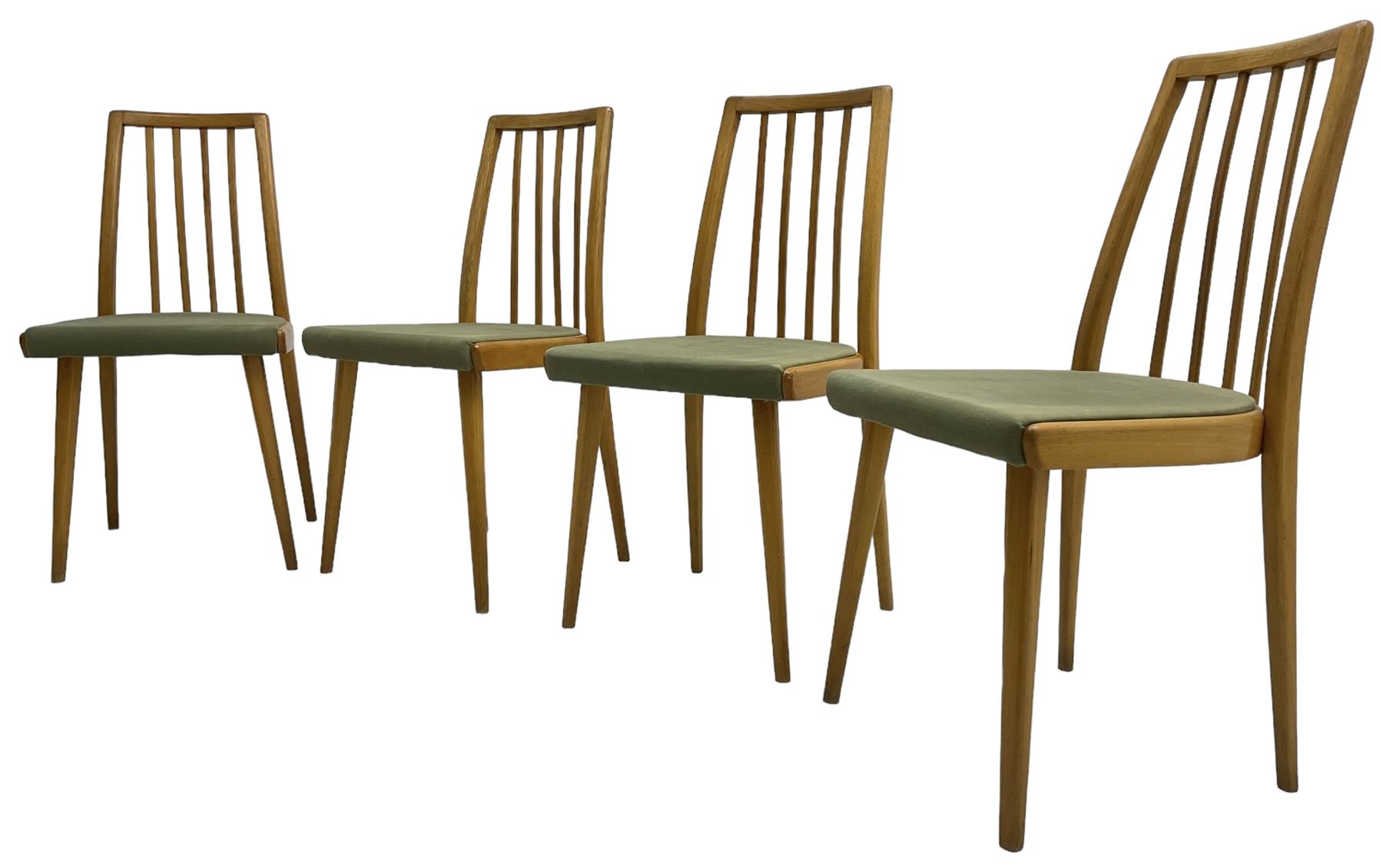 Set of four mid-20th century beech framed dining chairs, vertical slat back over upholstered seats, on tapering supports