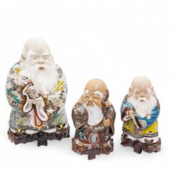 Group of three Chinese stoneware figures, modelled as the Three Stars or 'Sanxing' Gods of...