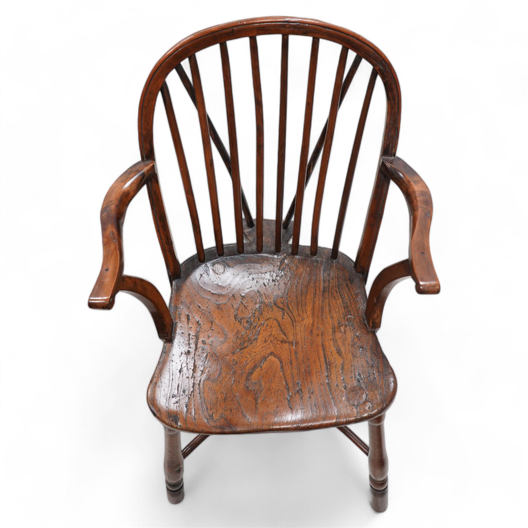 19th century yew wood and elm Thames Valley Windsor armchair, hoop and stick back over shaped arms, dished elm seat on turned supports united by crinoline stretcher 