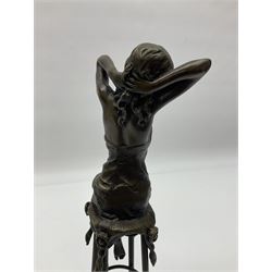 Art Deco style bronze modelled as a female figure seated upon a chair, after 'Pierre Collinet', H28cm