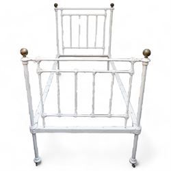 Victorian white painted cast iron 3' single bedstead, brass finials over floral moulded spindles, on castors