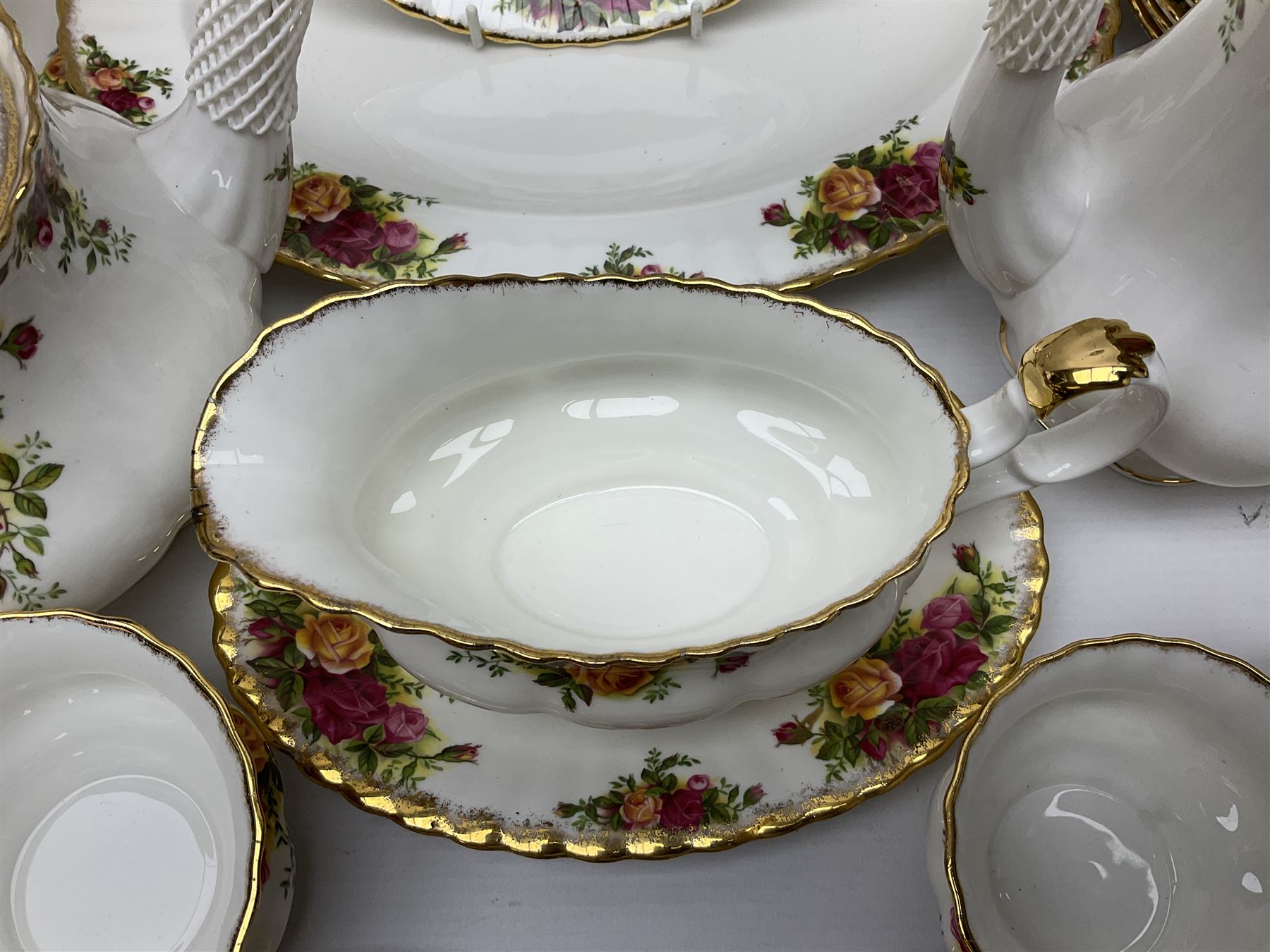 Royal Albert Old Country Roses pattern tea and dinner service, including teapot, coffee pot, two milk jugs, two open sucriers, six teacups and saucers, six dinner plates, six soup bowls, etc  