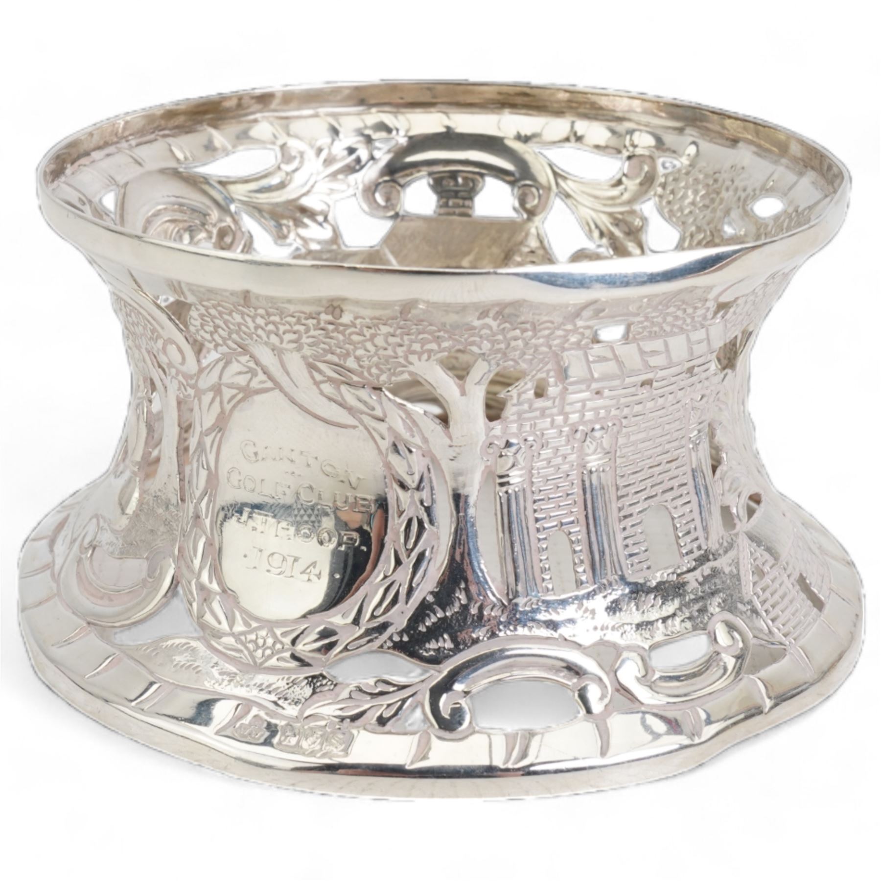 Silver miniature presentation dish ring, pierced and engraved with a pastoral scene, engraved 'Ganton Golf Club, J.T. Roop, 1914, hallmarked Wakely & Wheeler, Dublin 1913, H6cm, D11cm