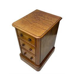 Pair of Victorian figured mahogany pedestal chests, rectangular form with rounded front corners, moulded top over three drawers with applied mouldings and turned handles, on moulded plinth base