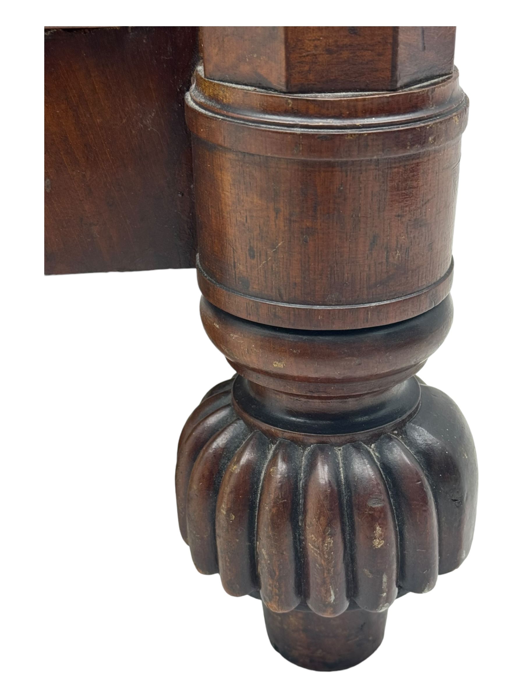 Early Victorian mahogany bow front chest, two short over three long graduating cockbeaded drawers, flanked by faceted columns with carved acanthus leaf capitals, standing on turned bun supports with fluted detailing