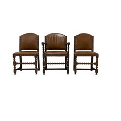 Set of six (4+2) early 20th century oak dining chairs, arched back and seat upholstered in tan leather with studwork detail, on turned supports united by bobbin-turned stretchers