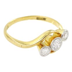 Early 20th century milgrain set three stone old cut diamond ring, stamped 18ct, total diamond weight approx 0.35 carat