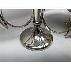 Silver plated three branch epergne, together with a silver plated cut glass claret jug, and silver plated embossed swing handled basket, epergne H30.5cm