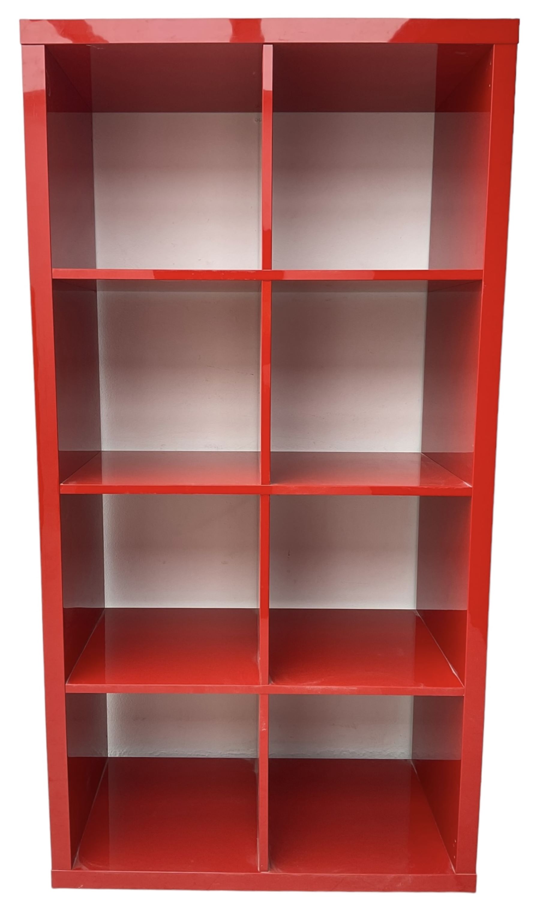 Modern red lacquered bookcase or shelving unit, with eight evenly divided compartments, finished in a high-gloss lacquer