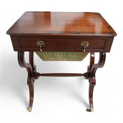 Regency mahogany work table, rectangular top with banded and moulded edge inlaid with checkered stringing, fitted with single cock-beaded drawer over upholstered sliding well, raised on scrolled twin end supports, united by a spiral-turned stretcher, on splayed supports with brass cups and castors