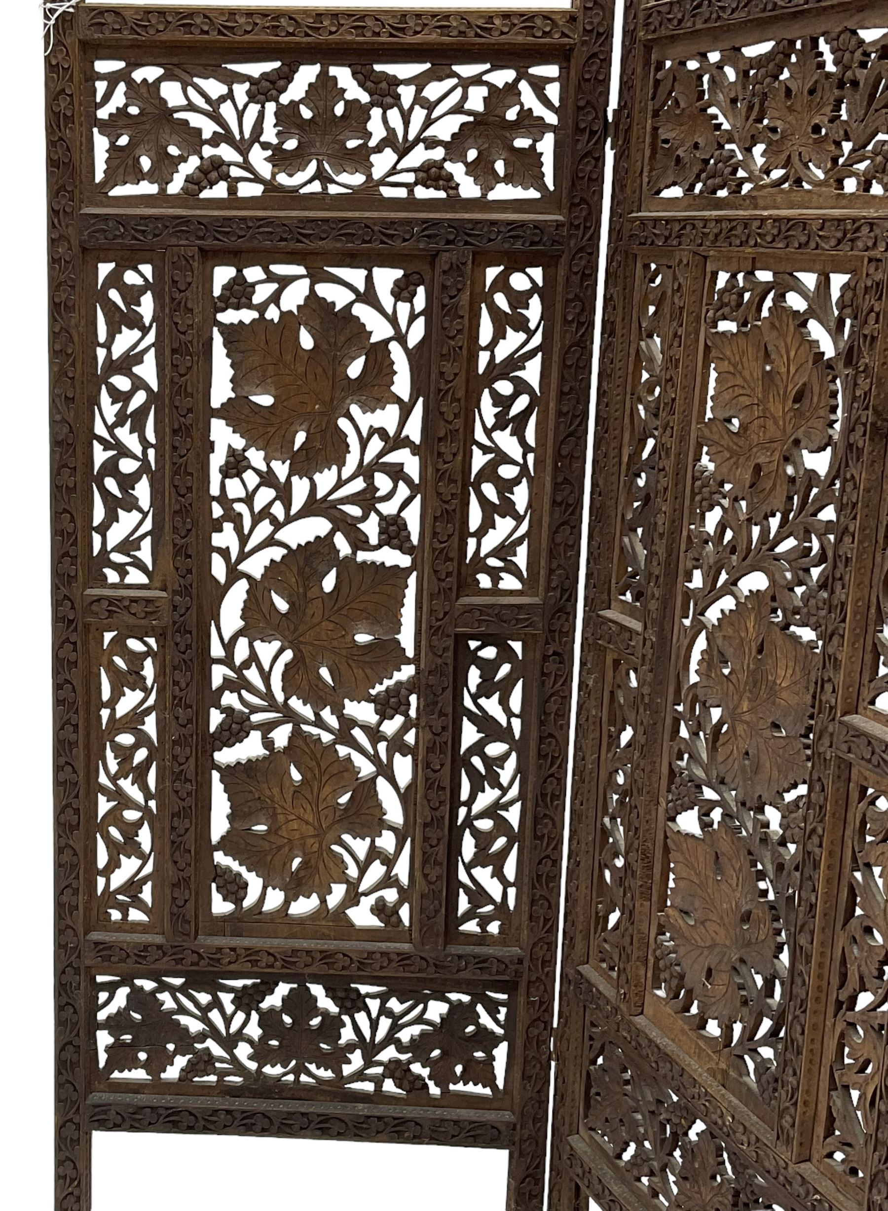 Anglo-Indian heavily carved and pierced three panel folding screen 