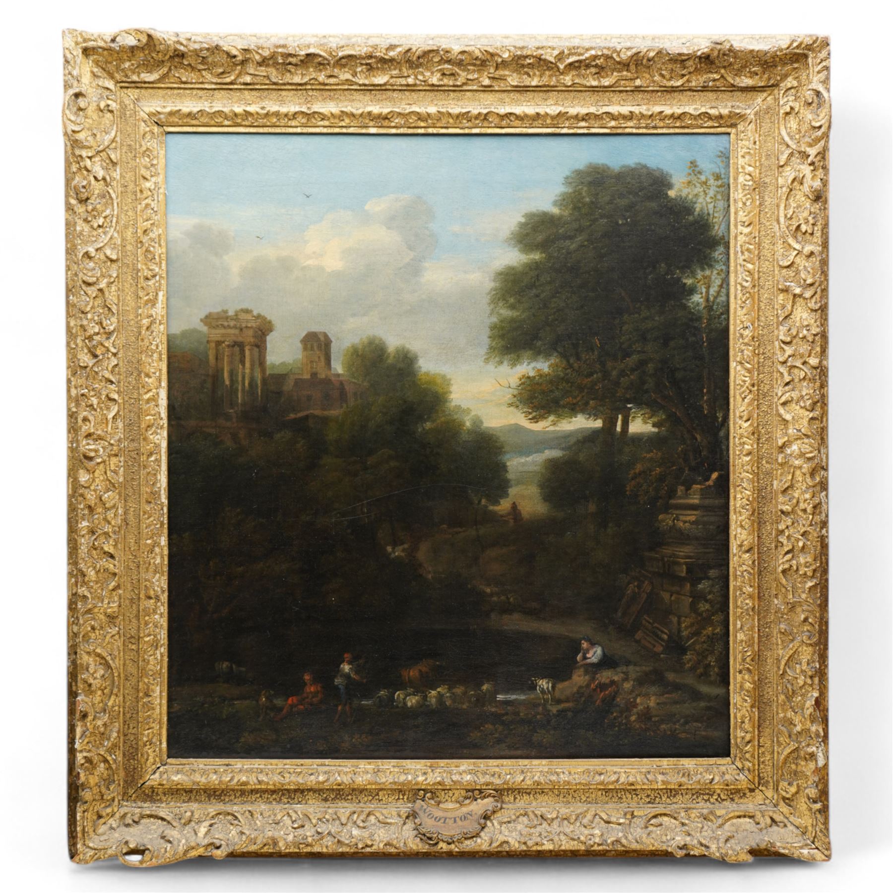 John Wootton (British 1678-1764): Extensive Italianate Capriccio Landscape with Classical Pastoral Figures, oil on canvas indistinctly signed lower centre 'J Wootton' 66cm x 61cm
Provenance: Purchased at Christie's, King Street, London, British Pictures Sale, July 1991, Lot 64
Notes: When sold at Christie's, they noted it was inscribed on an old label on the reverse: 'Landscape manner/Poussin(?) by John Wootton'. This work exemplifies the artist’s mastery of blending naturalism with classical idealization. The serene composition, featuring classical ruins, pastoral figures, and a luminous landscape, reflects the influence of both Poussin and Claude Lorrain, blending imaginary and real elements in a harmonious, timeless scene. It clearly demonstrates why his landscapes were often compared to the great French masters of the 17th century - and appealed to the tastes of contemporary aristocratic collectors.