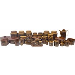 Hornsea Pottery Hairloom pattern dinner and tea wares, including five large storage jars with wooden lids, four tureens with lids, condiment set, vinegar jug, coffee pot with lid, four milk jugs, scurier with cover etc (44).   