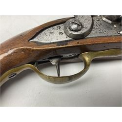19th century continental flintlock travelling pistol, approximately .75 calibre, the 18cm barrel with steel ramrod under, full walnut stock with brass furniture including skull crusher butt possibly with shoulder stock extension facility L33.5cm