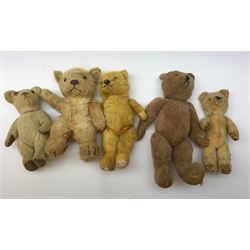Nine English teddy bears 1950s-60s including wood wool filled Pedigree bear with swivel jointed head, glass eyes, vertically stitched nose and mouth and jointed limbs H14.5