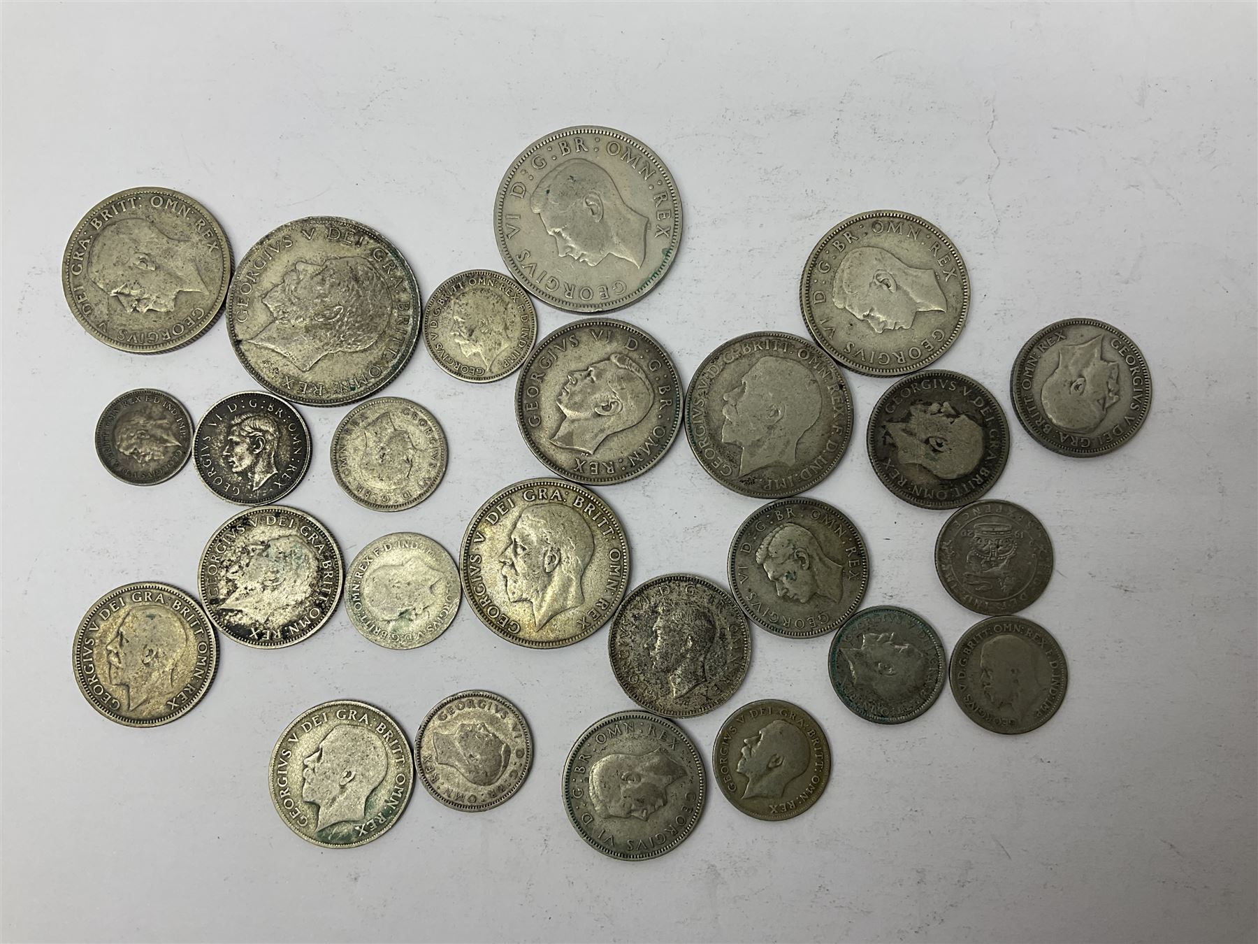 Approximately 135 grams of Great British pre 1947 silver coins, small number of pre 1920 silver threepence pieces, Australia 1935 Centenary florin token, pre-decimal pennies and other coinage